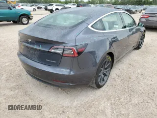 2018 Tesla Model 3 Long Range Battery z VIN 5YJ3E1EB2JF169809, wystawiony jako Copart lot #60623104 z przebiegiem 81 747 mil mil oraz Tytuł czysty. Historia ofert i sprzedaży dostępna na DreamBid. Obrazek 3.