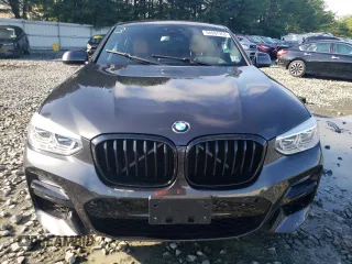 2021 BMW X4 M40i with VIN 5UX2V5C08M9G87220, listed as a Copart auction lot 64087953 with 0 mi miles. Bid and sale history available at carsss.com. Image 5.