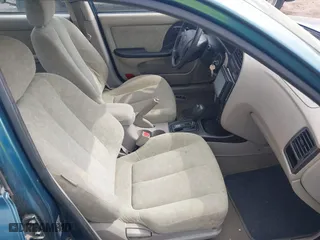 2003 Hyundai Elantra GLS with VIN KMHDN45D93U613247, listed as a IAAI auction lot 42095197 with 139,748 mi miles. Bid and sale history available at carsss.com. Image 5.