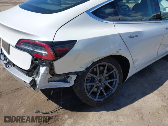 2020 Tesla Model 3 Standard Range Plus with VIN 5YJ3E1EA4LF644967, listed as a IAAI auction lot 41745984 with 23,479 mi miles and . Bid and sale history available at DreamBid. Image 20.