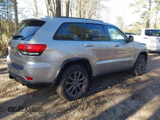 2016 Jeep Grand Cherokee Limited 75th Anniversary with VIN 1C4RJFBT9GC400873, listed as a IAAI auction lot 41834112 with 110,457 mi miles and . Bid and sale history available at DreamBid. Image 4.