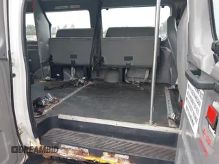 2005 Ford Econoline Cargo with VIN 1FTNE24W25HA14010, listed as a IAAI auction lot 41947382 with Not provided miles and . Bid and sale history available at DreamBid. Image 8.