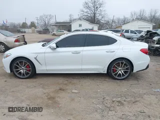 2020 Genesis G70 3.3T with VIN KMTG34LEXLU060919, listed as a IAAI auction lot 41619579 with 69,859 mi miles. Bid and sale history available at carsss.com. Image 15.