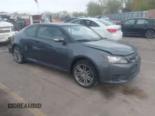 2013 Scion tC with VIN JTKJF5C76D3050374, listed as a IAAI auction lot 42024870 with 99,233 mi miles. Bid and sale history available at carsss.com. Image 1.