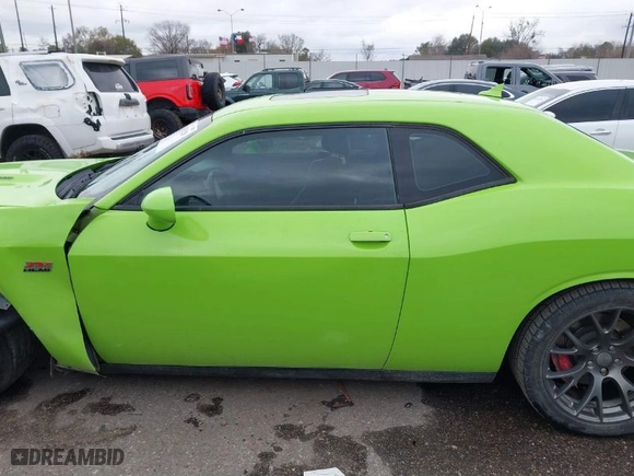 2015 Dodge Challenger SRT 392 with VIN 2C3CDZDJ3FH720636, listed as a IAAI auction lot 41285219 with 149,706 mi miles. Bid and sale history available at carsss.com. Image 14.