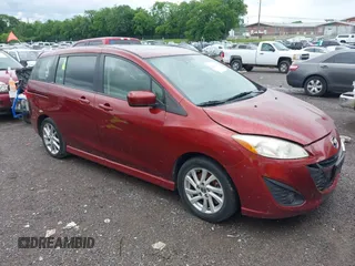2012 Mazda 5 Grand Touring z VIN JM1CW2DLXC0134997, wystawiony jako IAAI lot #42360574 z przebiegiem 230 951 mil mil oraz . Historia ofert i sprzedaży dostępna na DreamBid. Obrazek 1.