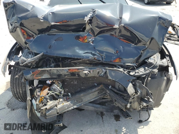 2017 Ford Mustang V6 z VIN 1FA6P8AM5H5235195, wystawiony jako Copart lot #59473115 z przebiegiem Nie podano mil oraz Szkoda całkowita • Salvage title. Historia ofert i sprzedaży dostępna na DreamBid. Obrazek 11.