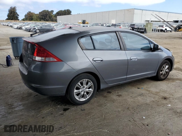 2011 Honda Insight EX with VIN JHMZE2H77BS006079, listed as a Copart auction lot 63873985 with 134,159 mi miles and Salvage title. Bid and sale history available at DreamBid. Image 3.