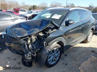 2021 Hyundai Tucson Value with VIN KM8J33A4XMU302596, listed as a IAAI auction lot 41643090 with 58,566 mi miles. Bid and sale history available at carsss.com. Image 17.