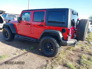 2015 Jeep Wrangler Unlimited Willys Wheeler with VIN 1C4BJWDG0FL635341, listed as a IAAI auction lot 41955393 with 145,529 mi miles and . Bid and sale history available at DreamBid. Image 3.