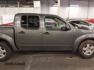 2005 Nissan Frontier LE with VIN 1N6AD07W95C451921, listed as a IAAI auction lot 40952064 with 234,900 mi miles and . Bid and sale history available at DreamBid. Image 13.