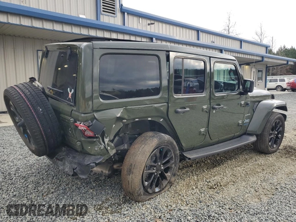 2023 Jeep Wrangler Sahara with VIN 1C4JJXP62PW553101, listed as a Copart auction lot 85543124 with 28,157 mi miles and Salvage Title. Bid and sale history available at DreamBid. Image 3.