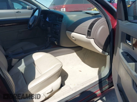 2001 Cadillac Catera z VIN W06VR54R01R003061, wystawiony jako IAAI lot #41989882 z przebiegiem 77 248 mil mil oraz . Historia ofert i sprzedaży dostępna na DreamBid. Obrazek 5.