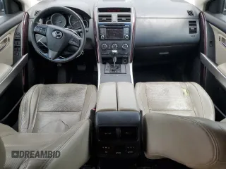 2015 Mazda CX-9 Grand Touring z VIN JM3TB3DV0F0461438, wystawiony jako Copart lot #61615275 z przebiegiem 212 252 mil mil oraz Szkoda całkowita • Salvage title. Historia ofert i sprzedaży dostępna na DreamBid. Obrazek 8.
