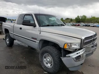 1999 Dodge 2500 z VIN 1B7KF2361XJ509781, wystawiony jako Copart lot #57282495 z przebiegiem 135 666 mil mil oraz Szkoda całkowita • Salvage title. Historia ofert i sprzedaży dostępna na DreamBid. Obrazek 4.