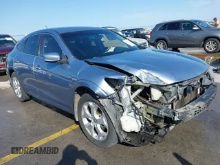 2010 Honda Crosstour EX-L z VIN 5J6TF1H50AL002794, wystawiony jako IAAI lot #42022338 z przebiegiem 156 620 mil mil oraz . Historia ofert i sprzedaży dostępna na DreamBid. Obrazek 1.