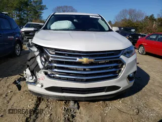 2021 Chevrolet Traverse High Country with VIN 1GNEVNKW6MJ107437, listed as a Copart auction lot 36757224 with Not Provided miles and Salvage Title. Bid and sale history available at carsss.com. Image 5.