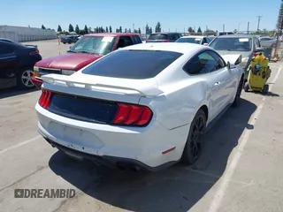 2019 Ford Mustang EcoBoost with VIN 1FA6P8TH4K5131093, listed as a IAAI auction lot 42335837 with 101,244 mi miles and . Bid and sale history available at DreamBid. Image 4.