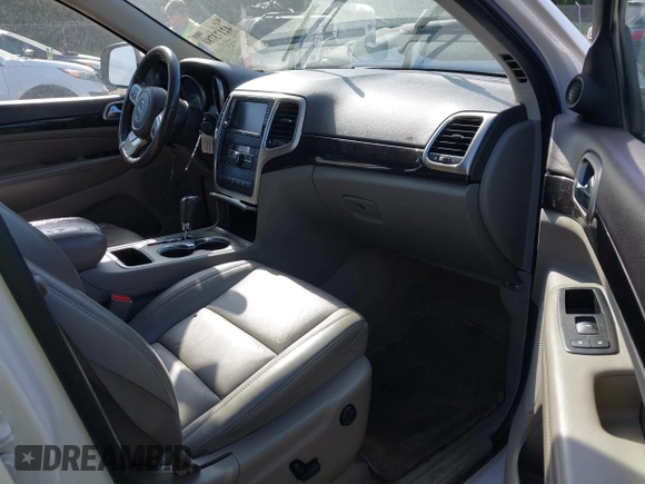 2011 Jeep Grand Cherokee Laredo with VIN 1J4RS4GGXBC517068, listed as a IAAI auction lot 42173780 with 170,688 mi miles and . Bid and sale history available at DreamBid. Image 5.