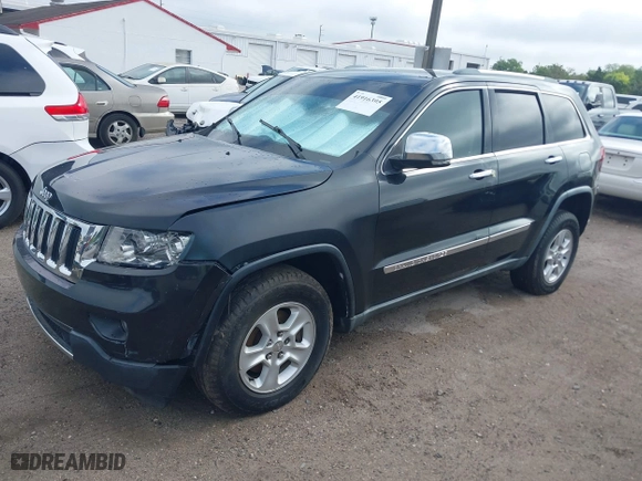 2011 Jeep Grand Cherokee Limited with VIN 1J4RR5GG1BC581520, listed as a IAAI auction lot 41916395 with 151,613 mi miles. Bid and sale history available at carsss.com. Image 22.