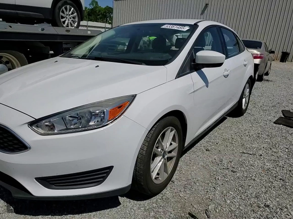 2018 Ford Focus SE z VIN 1FADP3F29JL295712, wystawiony jako Copart lot #53361485 z przebiegiem 55 857 mil mil oraz Szkody całkowita. Historia ofert i sprzedaży dostępna na DreamBid. Obrazek 11.