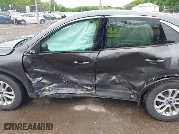 2020 Ford Escape SE with VIN 1FMCU9G64LUA25167, listed as a IAAI auction lot 42307557 with 82,524 mi miles and . Bid and sale history available at DreamBid. Image 6.