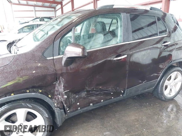 2015 Chevrolet Trax LTZ with VIN KL7CJTSB9FB147244, listed as a IAAI auction lot 41722081 with 125,675 mi miles. Bid and sale history available at carsss.com. Image 6.
