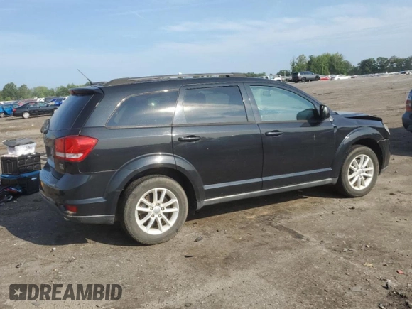 2013 Dodge Journey SXT with VIN 3C4PDCBG4DT619319, listed as a Copart auction lot 62964135 with 140,620 mi miles and Salvage title. Bid and sale history available at DreamBid. Image 3.