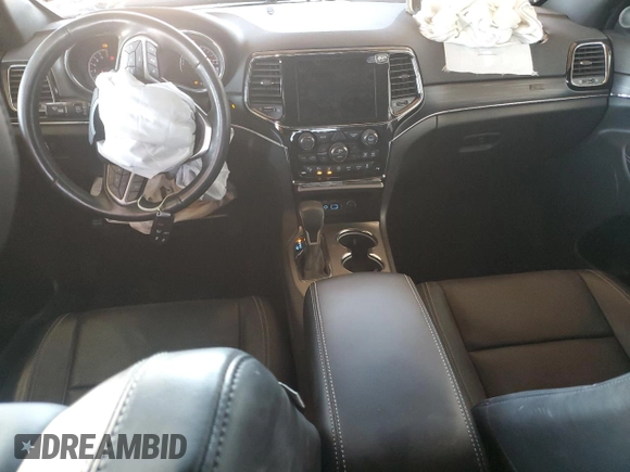 2021 Jeep Grand Cherokee 80th Anniversary with VIN 1C4RJFBG3MC631086, listed as a Copart auction lot 57304375 with 57,872 mi miles and Salvage title. Bid and sale history available at DreamBid. Image 8.