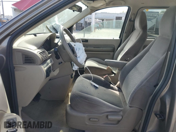 2005 Ford Freestar SE z VIN 2FMDA51635BA60614, wystawiony jako Copart lot #60058044 z przebiegiem 228 858 mil mil oraz Szkody całkowita. Historia ofert i sprzedaży dostępna na DreamBid. Obrazek 7.