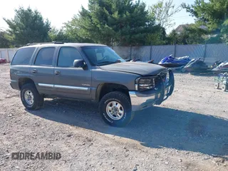 2002 GMC Yukon SLT z VIN 1GKEK13Z42J299221, wystawiony jako IAAI lot #40302959 z przebiegiem 260 096 mil mil oraz . Historia ofert i sprzedaży dostępna na DreamBid. Obrazek 1.
