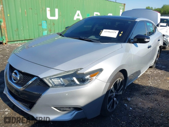 2018 Nissan Maxima S with VIN 1N4AA6AP0JC364148, listed as a IAAI auction lot 41984524 with 24,419 mi miles and . Bid and sale history available at DreamBid. Image 17.