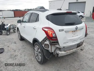 2017 Buick Encore Essence with VIN KL4CJCSB7HB011839, listed as a IAAI auction lot 41303660 with 80,789 mi miles and . Bid and sale history available at carsss.com. Image 6.