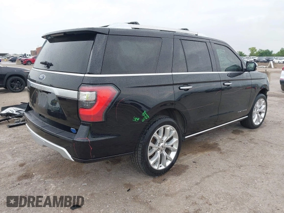 2019 Ford Expedition Platinum with VIN 1FMJU1LT1KEA23423, listed as a IAAI auction lot 42134271 with 59,180 mi miles and . Bid and sale history available at DreamBid. Image 4.