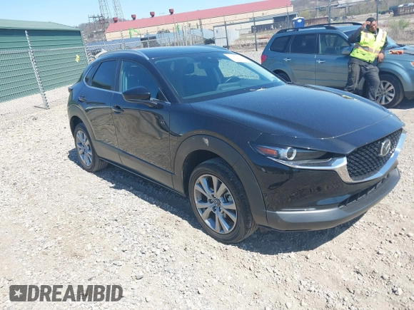 2023 Mazda CX-30 S Carbon Edition with VIN 3MVDMBCM1PM509987, listed as a IAAI auction lot 42060833 with 14,140 mi miles and . Bid and sale history available at DreamBid. Image 1.