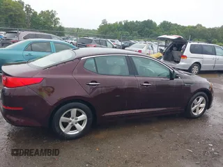 2014 Kia Optima LX z VIN 5XXGM4A73EG270576, wystawiony jako IAAI lot #42335343 z przebiegiem 207 000 mil mil oraz . Historia ofert i sprzedaży dostępna na DreamBid. Obrazek 13.