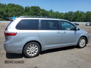 2015 Toyota Sienna Limited with VIN 5TDDK3DC4FS111836, listed as a Copart auction lot 61940595 with 111,579 mi miles and Salvage title. Bid and sale history available at DreamBid. Image 3.