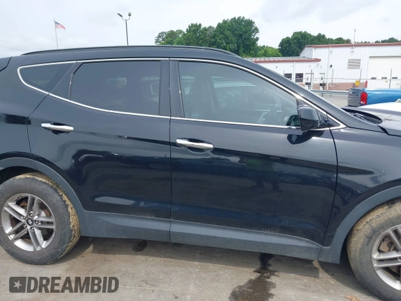 2017 Hyundai Santa Fe 2.4L with VIN 5NMZUDLB0HH037142, listed as a IAAI auction lot 42323880 with 87,396 mi miles and . Bid and sale history available at DreamBid. Image 12.