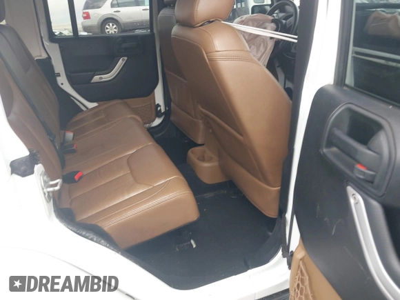 2016 Jeep Wrangler Unlimited Rubicon Hard Rock with VIN 1C4BJWFG3GL228449, listed as a IAAI auction lot 42158318 with Not provided miles and . Bid and sale history available at DreamBid. Image 8.