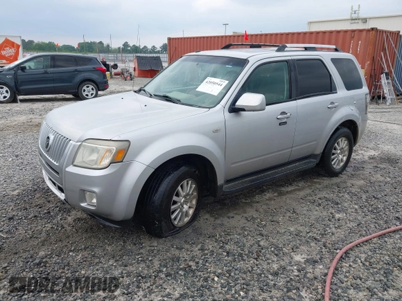 2009 Mercury Mariner Premier z VIN 4M2CU87G59KJ25154, wystawiony jako IAAI lot #42050544 z przebiegiem 210 905 mil mil oraz . Historia ofert i sprzedaży dostępna na DreamBid. Obrazek 2.