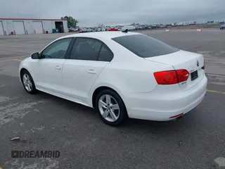 2014 Volkswagen Jetta TDI w/Premium with VIN 3VWLL7AJXEM372547, listed as a IAAI auction lot 42320105 with 113,200 mi miles and . Bid and sale history available at DreamBid. Image 3.