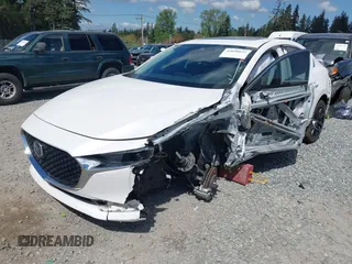 2023 Mazda 3 S Preferred with VIN 3MZBPACM9PM377164, listed as a IAAI auction lot 42098075 with 24,764 mi miles and . Bid and sale history available at DreamBid. Image 2.