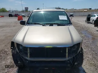 2005 GMC Envoy SLE with VIN 1GKDT13S252264932, listed as a IAAI auction lot 41981566 with 140,566 mi miles. Bid and sale history available at carsss.com. Image 13.