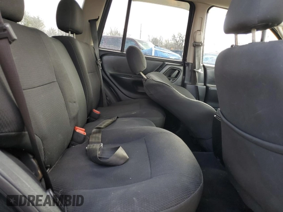 2004 Jeep Grand Cherokee Laredo with VIN 1J4GW48S84C184757, listed as a Copart auction lot 52895745 with 242,307 mi miles and Salvage Title. Bid and sale history available at carsss.com. Image 12.