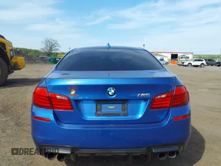 2013 BMW M5 with VIN WBSFV9C56DC774032, listed as a IAAI auction lot 42124754 with 55,409 mi miles. Bid and sale history available at carsss.com. Image 16.