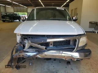 2001 Ford F-150 XLT with VIN 1FTRW07W51KE03221, listed as a Copart auction lot 63628855 with 237,510 mi miles and Salvage title. Bid and sale history available at DreamBid. Image 5.
