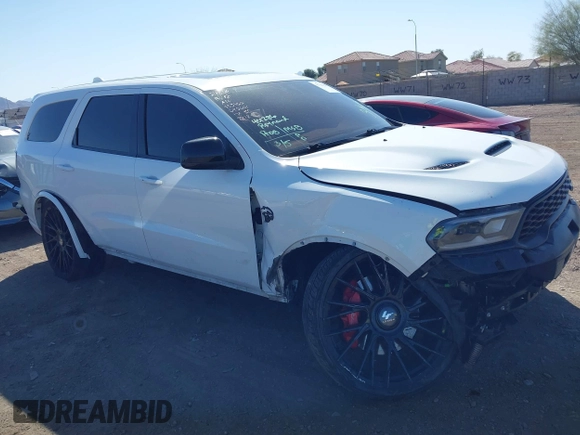 2021 Dodge Durango SRT Hellcat with VIN 1C4SDJH96MC692601, listed as a IAAI auction lot 41764490 with 27,434 mi miles and . Bid and sale history available at DreamBid. Image 18.