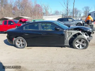 2016 Dodge Charger SXT with VIN 2C3CDXHG4GH196708, listed as a IAAI auction lot 41892104 with 142,765 mi miles. Bid and sale history available at carsss.com. Image 13.