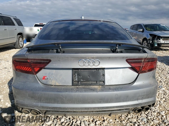 2018 Audi S7 Prestige z VIN WAU2FAFCXJN039744, wystawiony jako Copart lot #81291564 z przebiegiem 73 238 mil mil oraz Szkoda całkowita • Salvage title. Historia ofert i sprzedaży dostępna na DreamBid. Obrazek 6.