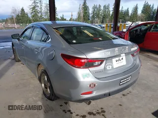 2017 Mazda Mazda6 Touring with VIN JM1GL1V50H1144637, listed as a IAAI auction lot 41849569 with 100,047 mi miles. Bid and sale history available at carsss.com. Image 3.